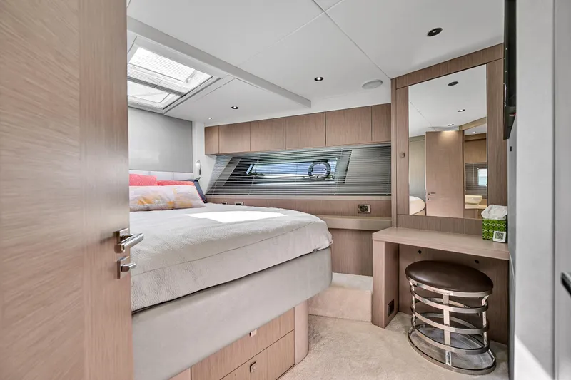 Slide: The Image of Luxurious bedroom interior of 2020 Sunseeker Manhattan 52 yacht, featuring modern design and natural light. - 31