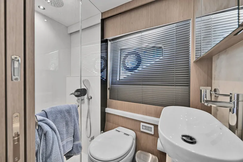 Slide: The Image of Luxurious bathroom in 2020 Sunseeker Manhattan 52 yacht, featuring modern fixtures and elegant design. - 44