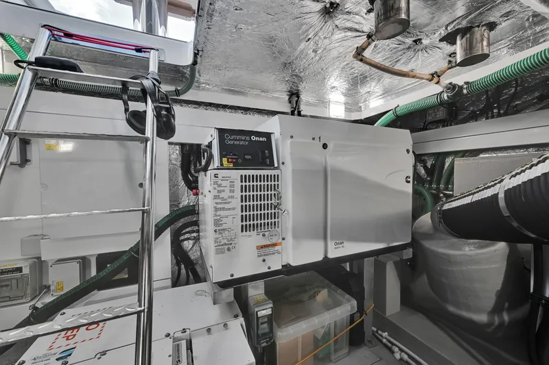 Slide: The Image of Engine room of 2020 Sunseeker Manhattan 52 yacht with Cummins Onan generator. - 50
