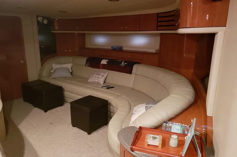 Slide: The Image of Luxurious interior of 1998 Sea Ray 540 Sundancer yacht with curved leather seating. - 21