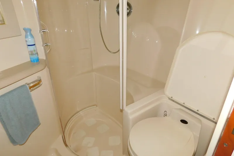Slide: The Image of Bathroom interior of 1998 Sea Ray 540 Sundancer yacht with shower and toilet. - 23