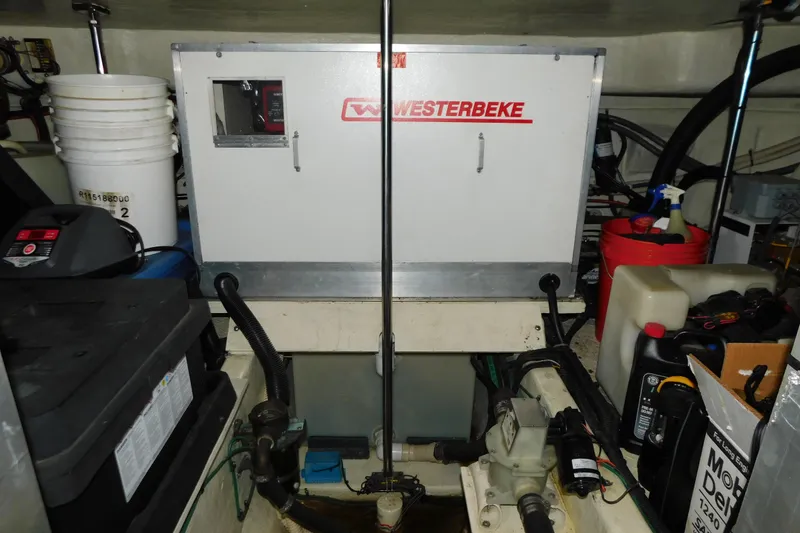 Slide: The Image of Engine room of 1998 Sea Ray 540 Sundancer with Westerbeke generator. - 37