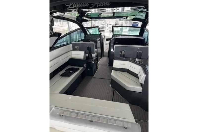 Slide: The Image of 2021 Cobalt A36BR boat interior with luxurious seating and modern design. - 6