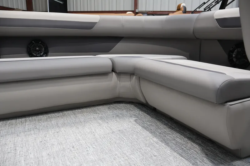 Slide: The Image of Luxurious seating in the 2026 Premier 200 Sunscape RF boat interior. - 34