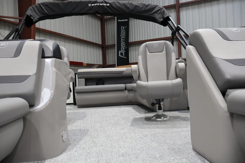 Slide: The Image of Interior view of 2026 Premier 200 Sunscape RF pontoon boat with luxurious seating. - 22