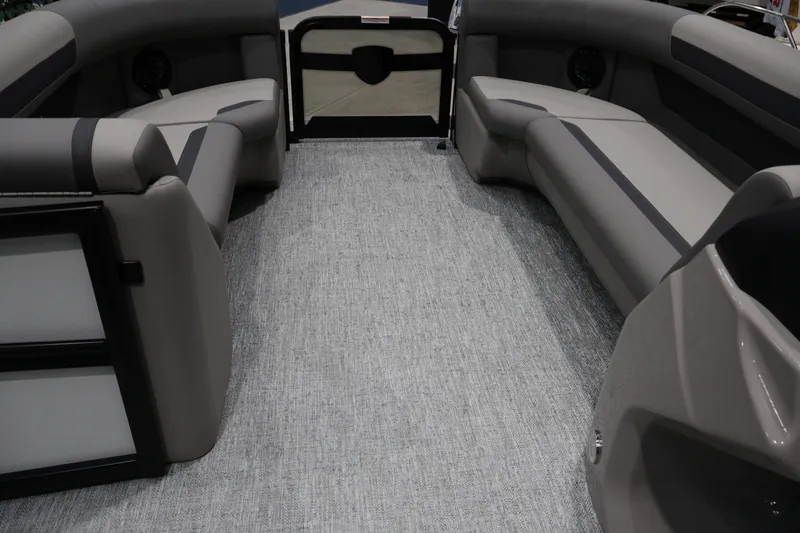 Slide: The Image of Interior of 2026 Premier 200 Sunscape RF pontoon boat with gray seating and flooring. - 20