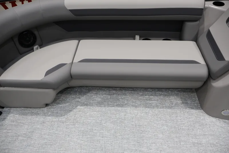 Slide: The Image of Luxurious seating in the 2026 Premier 200 Sunscape RF boat, featuring sleek gray upholstery. - 23