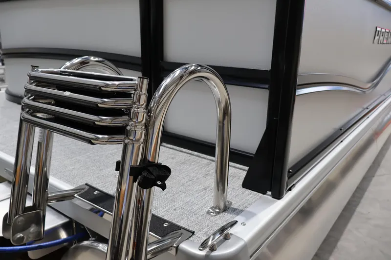Slide: The Image of 2026 Premier 200 Sunscape RF boat with stainless steel ladder and sleek design. - 9