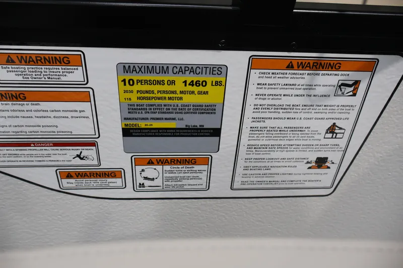 Slide: The Image of Safety and capacity warnings on a 2026 Premier 200 Sunscape RF boat. - 41