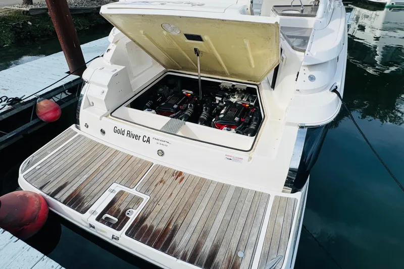 Slide: The Image of 2006 Regal 3360 Window Express boat with open engine compartment, docked in Gold River, CA. - 23