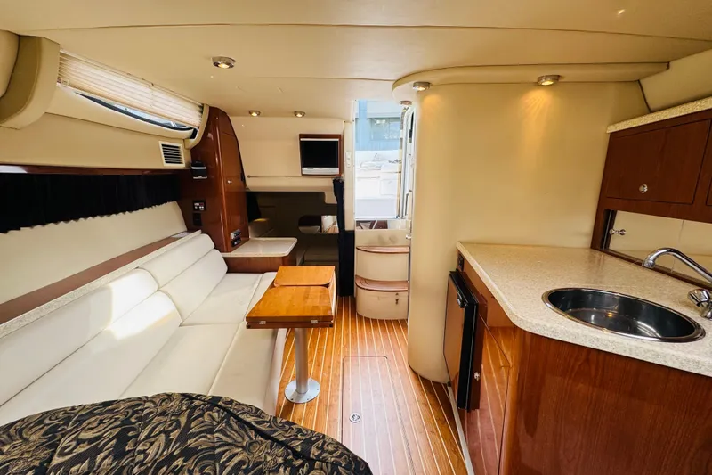 Slide: The Image of Luxurious interior of 2006 Regal 3360 Window Express yacht with modern amenities. - 52