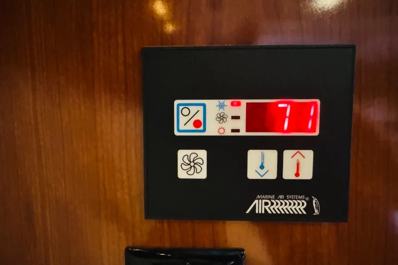 Slide: The Image of Marine air systems control panel on 2006 Regal 3360 Window Express boat. - 55