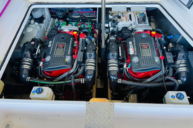 Slide: The Image of Engine compartment of a 2006 Regal 3360 Window Express with dual Volvo Penta engines. - 62