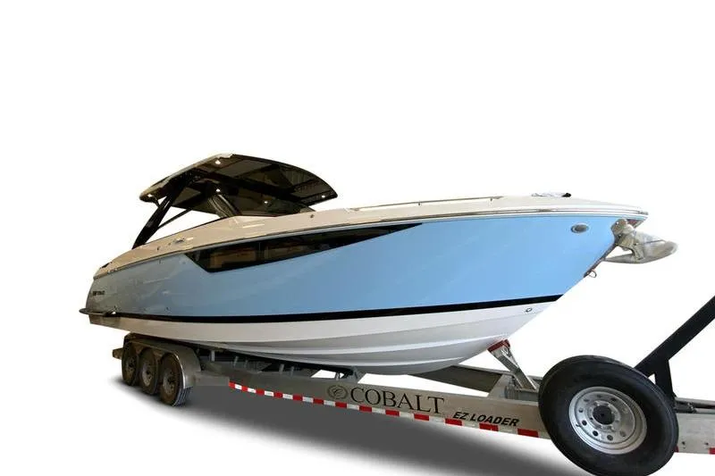 The Image of 2026 Cobalt R35 boat on trailer, sleek design, light blue hull. - 1