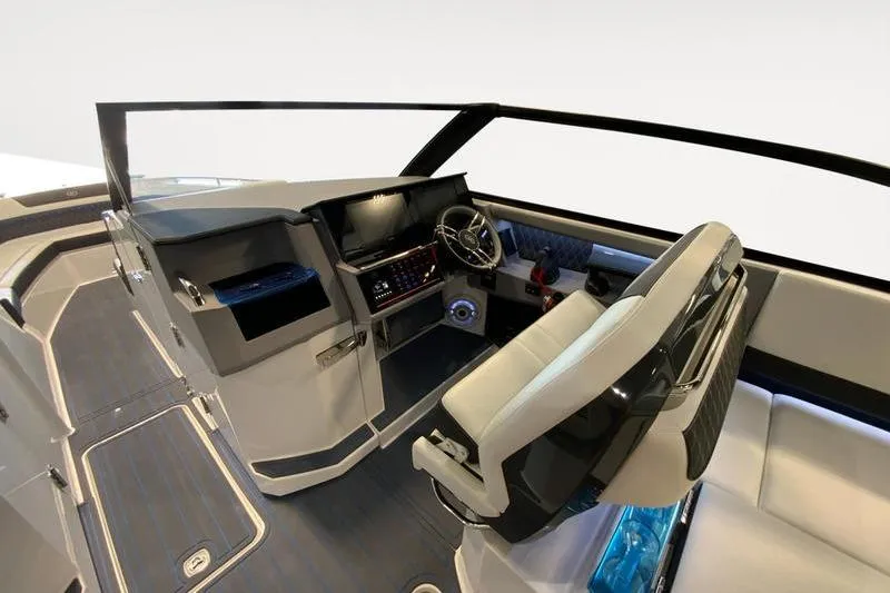 Slide: The Image of 2026 Cobalt R35 boat interior with modern dashboard and steering wheel. - 13