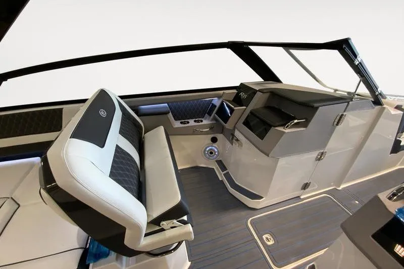 Slide: The Image of Interior of 2026 Cobalt R35 boat, featuring modern seating and sleek dashboard design. - 15