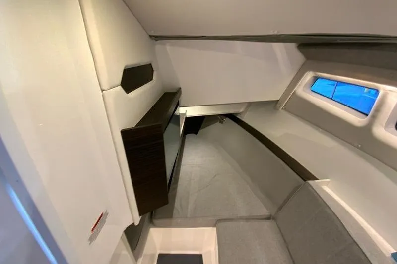 Slide: The Image of Interior cabin of 2026 Cobalt R35 boat, featuring modern design and comfortable seating. - 19