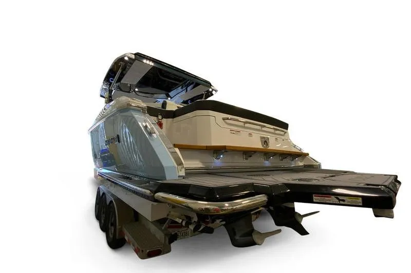 Slide: The Image of 2026 Cobalt R35 boat on trailer, rear view with extended swim platform. - 3