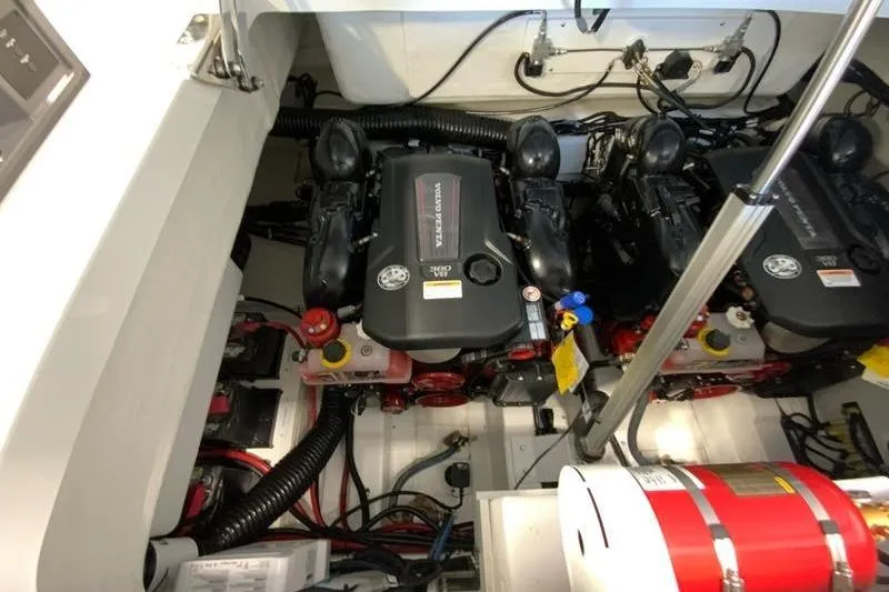 Slide: The Image of Engine compartment of a 2026 Cobalt R35 boat, featuring dual inboard motors. - 41