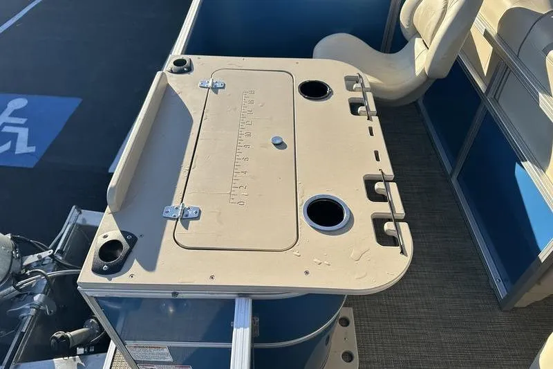 Slide: The Image of 2019 Starcraft EX 20 F4 boat interior with fishing station and seating. - 27