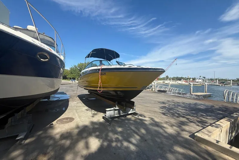 Slide: The Image of 2015 Monterey 264FS boat on dock, sunny day, marina background. - 3