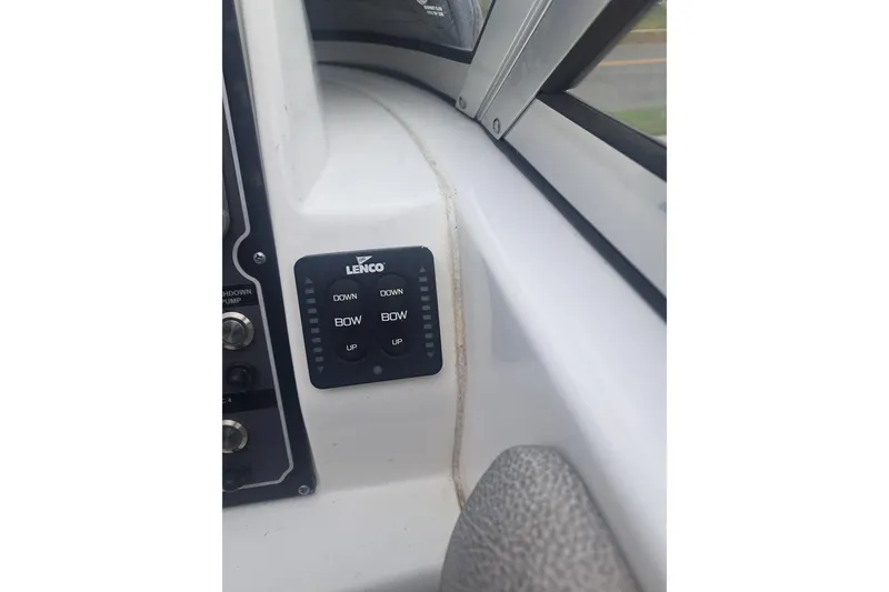 Slide: The Image of 2019 Sea Fox 226 Traveler boat interior with gray seating and white deck. - 14