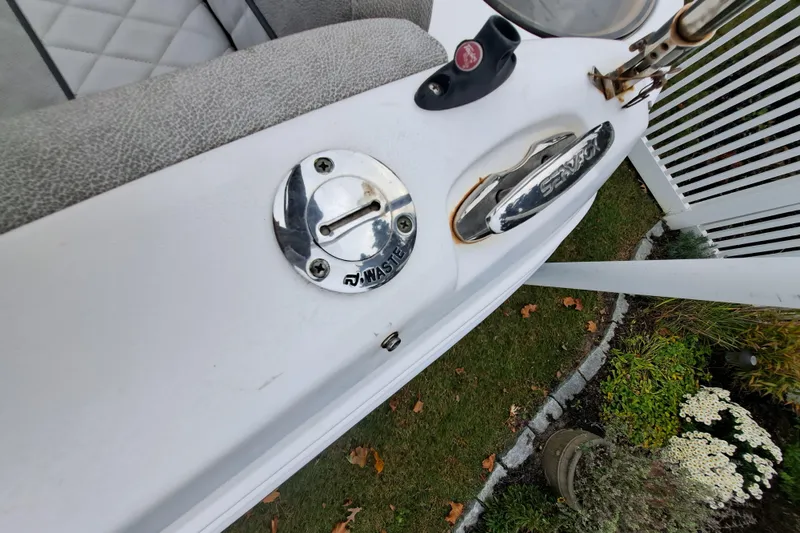 Slide: The Image of 2019 Sea Fox 226 Traveler boat interior with speaker and gray seating. - 16