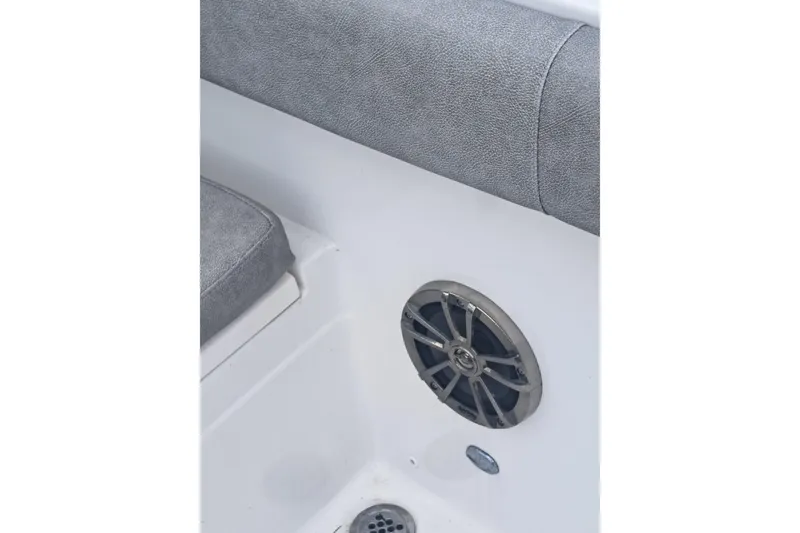 Slide: The Image of 2019 Sea Fox 226 Traveler boat interior with gray cushioned seating. - 19