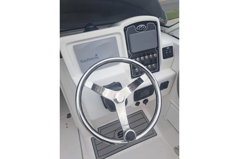 Slide: The Image of 2019 Sea Fox 226 Traveler boat rear view with warning label and trailer. - 24