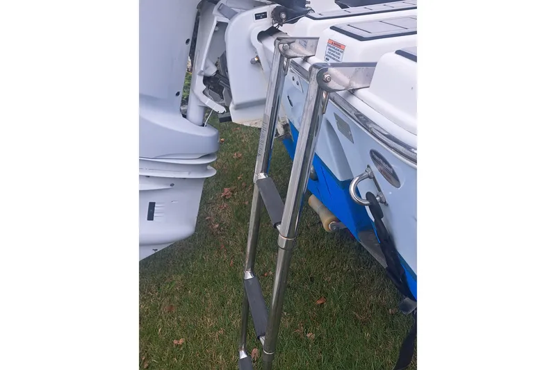 Slide: The Image of Trailer for 2019 Sea Fox 226 Traveler boat on grass. - 30