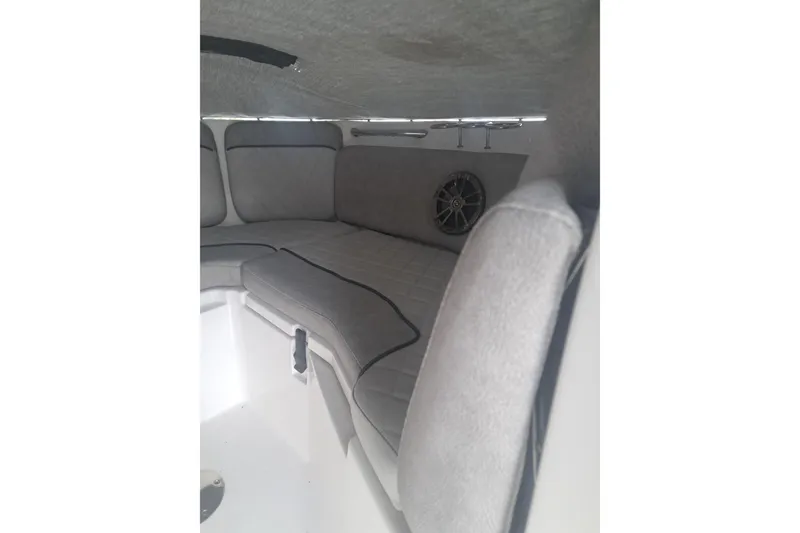 Slide: The Image of Interior of 2019 Sea Fox 226 Traveler boat with cushioned seating and speaker. - 7