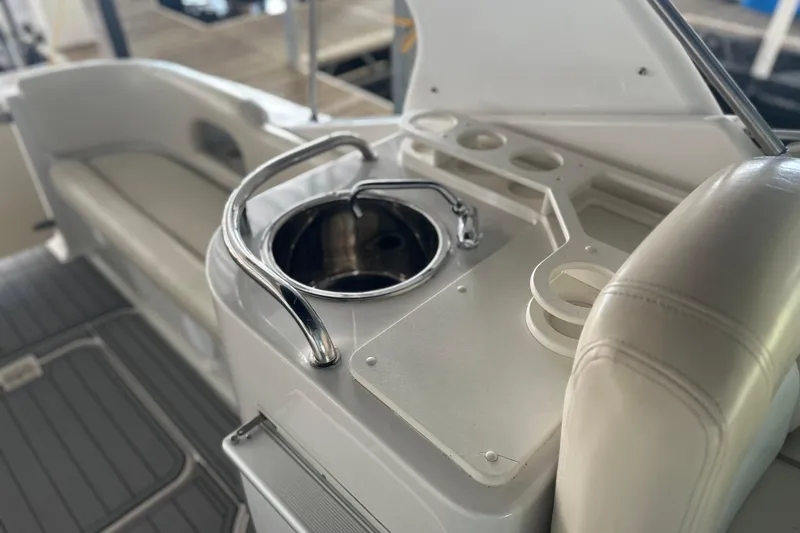 Slide: The Image of 2000 Chris-Craft 308 Express Cruiser interior with sink and seating area. - 35