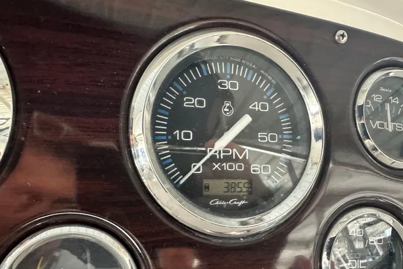 Slide: The Image of RPM gauge of 2000 Chris-Craft 308 Express Cruiser showing 3855 hours. - 63