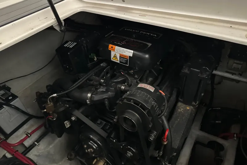 Slide: The Image of Engine compartment of a 2000 Chris-Craft 308 Express Cruiser with Volvo Penta engine. - 65