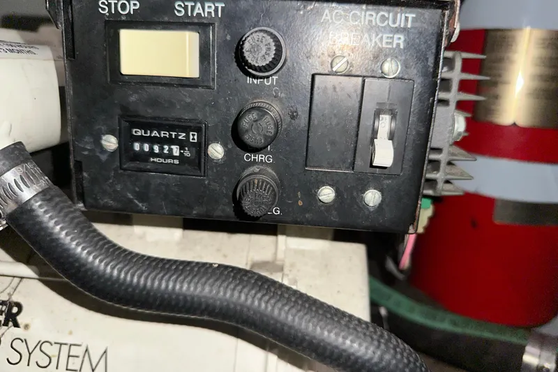 Slide: The Image of Control panel of a 2000 Chris-Craft 308 Express Cruiser with hour meter display. - 68