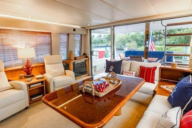 Slide: The Image of Luxurious interior of 2000 Pacific Mariner 65 Motoryacht with elegant seating and decor. - 11