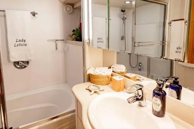 Slide: The Image of Luxurious bathroom in 2000 Pacific Mariner 65 Motoryacht with elegant fixtures and decor. - 16