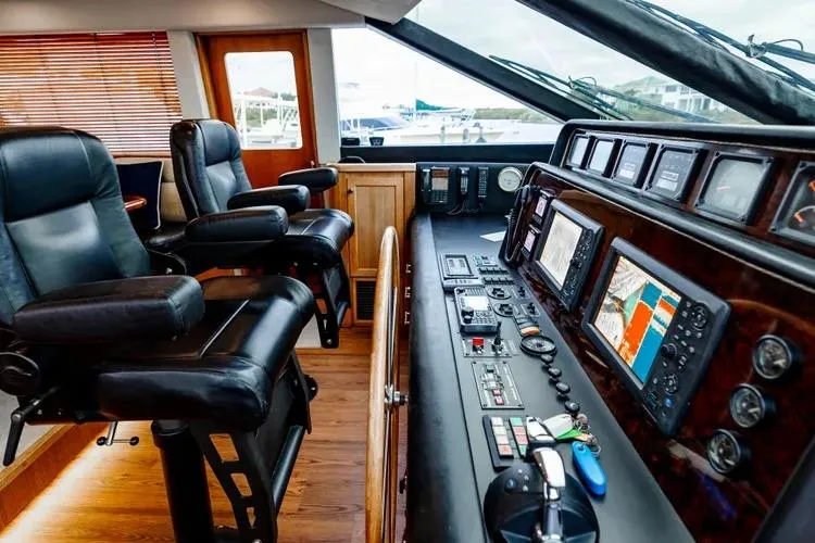 Slide: The Image of Cockpit of 2000 Pacific Mariner 65 Motoryacht with navigation equipment and leather seating. - 53