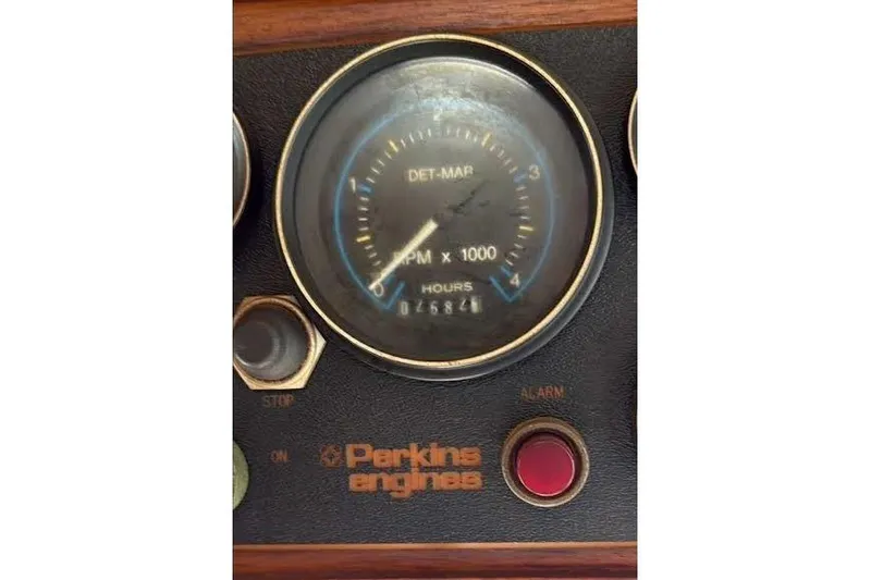 Slide: The Image of Instrument panel of a 1987 Monk 36 Trawler with Perkins engine gauge. - 30