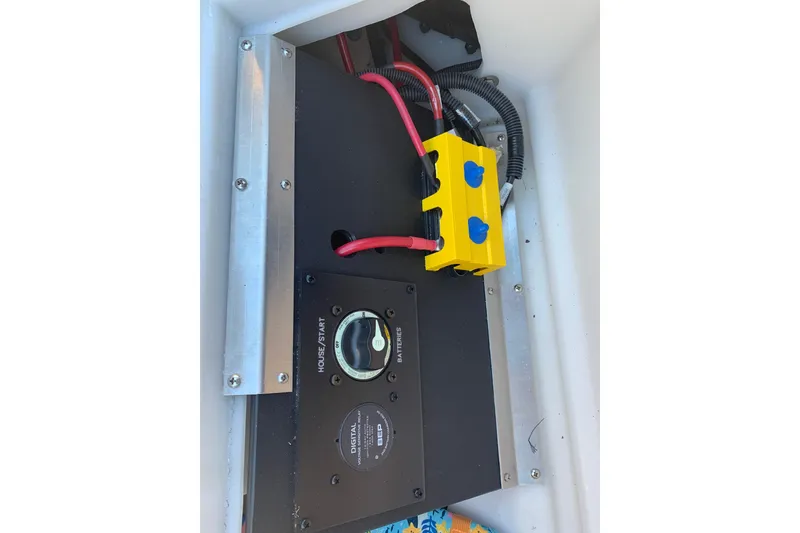 Slide: The Image of Battery compartment of 2025 Barletta Cabrio 22QC with wiring and control panel. - 15
