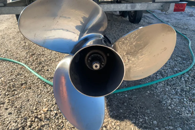Slide: The Image of Close-up of a boat propeller on a 2025 Barletta Cabrio 22QC. - 19