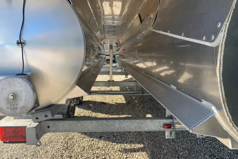 Slide: The Image of Underneath view of 2025 Barletta Cabrio 22QC pontoon boat on trailer. - 31