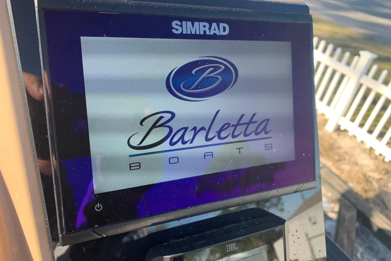 Slide: The Image of Simrad display showing Barletta Boats logo on 2025 Cabrio 22QC. - 7