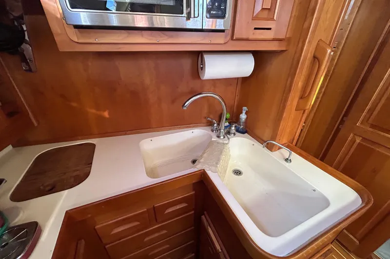 Slide: The Image of Close up on Countertop and Sinks - 22