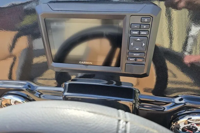 Slide: The Image of 2026 Xpress H17C Crappie boat dashboard with Garmin navigation system. - 13