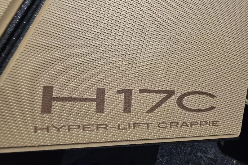 Slide: The Image of 2026 Xpress H17C Crappie boat logo on textured surface. - 21