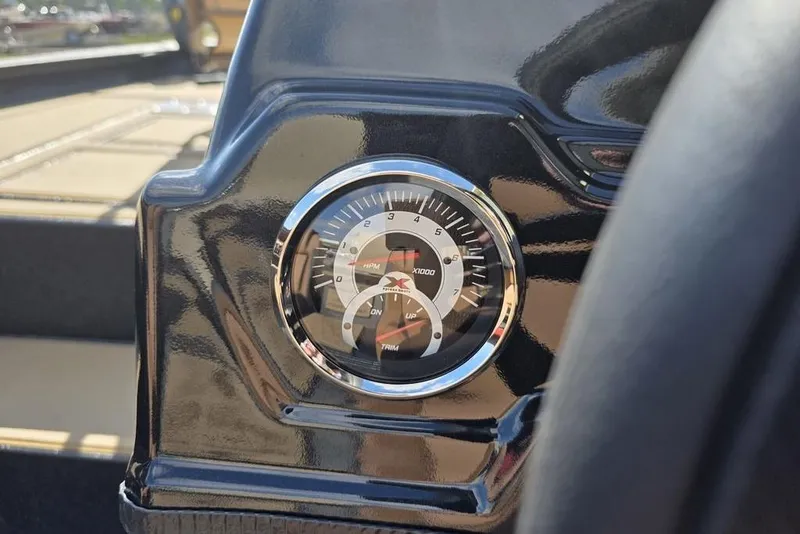 Slide: The Image of Tachometer on 2026 Xpress H17C Crappie boat dashboard, displaying RPM and trim levels. - 6