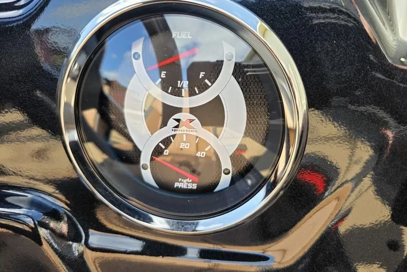 Slide: The Image of Close-up of 2026 Xpress H17C Crappie boat fuel and pressure gauges. - 7