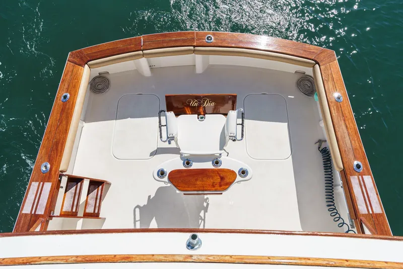 Slide: The Image of Aerial view of 1984 Post 43 boat deck with wooden trim and fishing chair. - 27