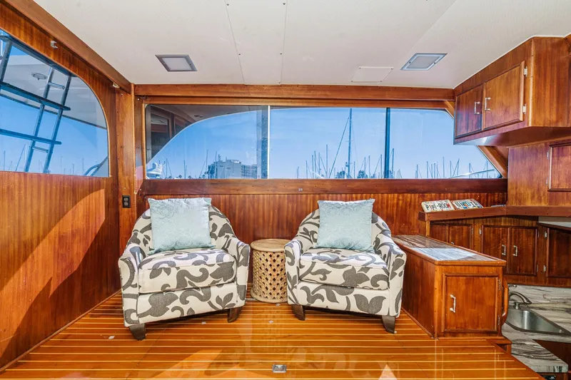 Slide: The Image of Luxurious 1984 Post 43 yacht interior with elegant chairs and wooden cabinetry. - 41